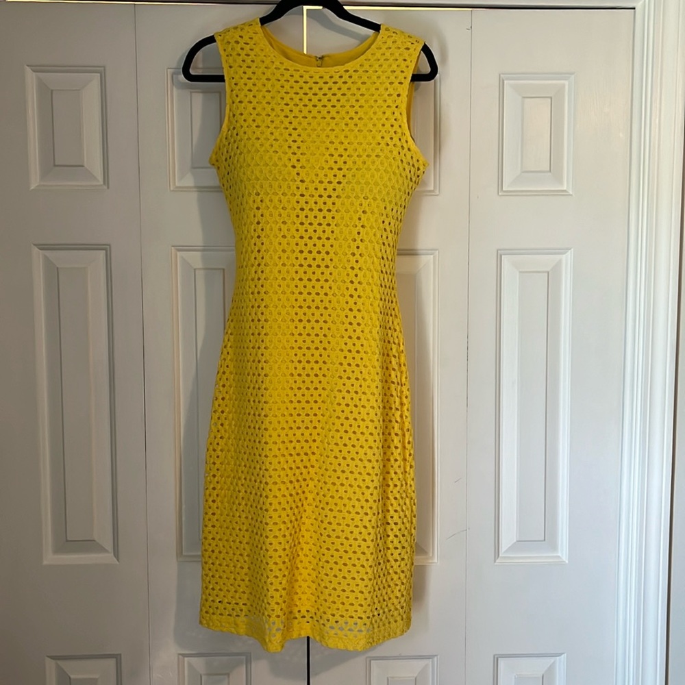 Yellow dress. Size 12 form fitting, lined.